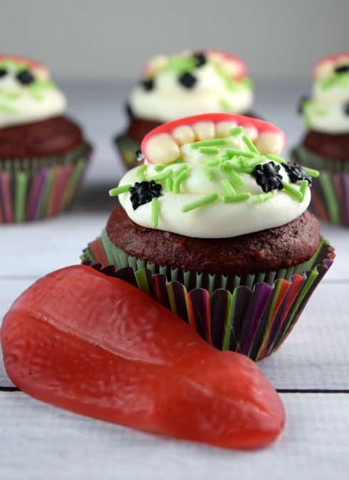 The cupcake that bites back!  Make these creepy fang #cupcakes for #halloween!
